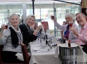 A Beyond Ordinary Travel group enjoying wine with their meal